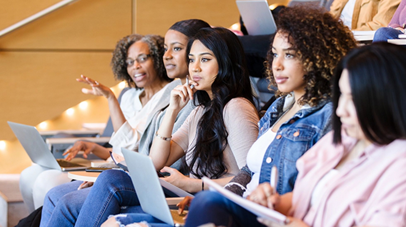 students seated in a lecture hall