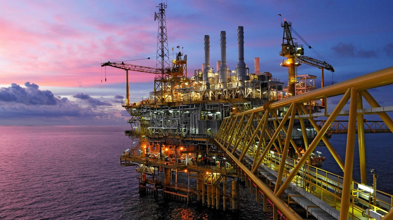 An offshore rig at twilight.