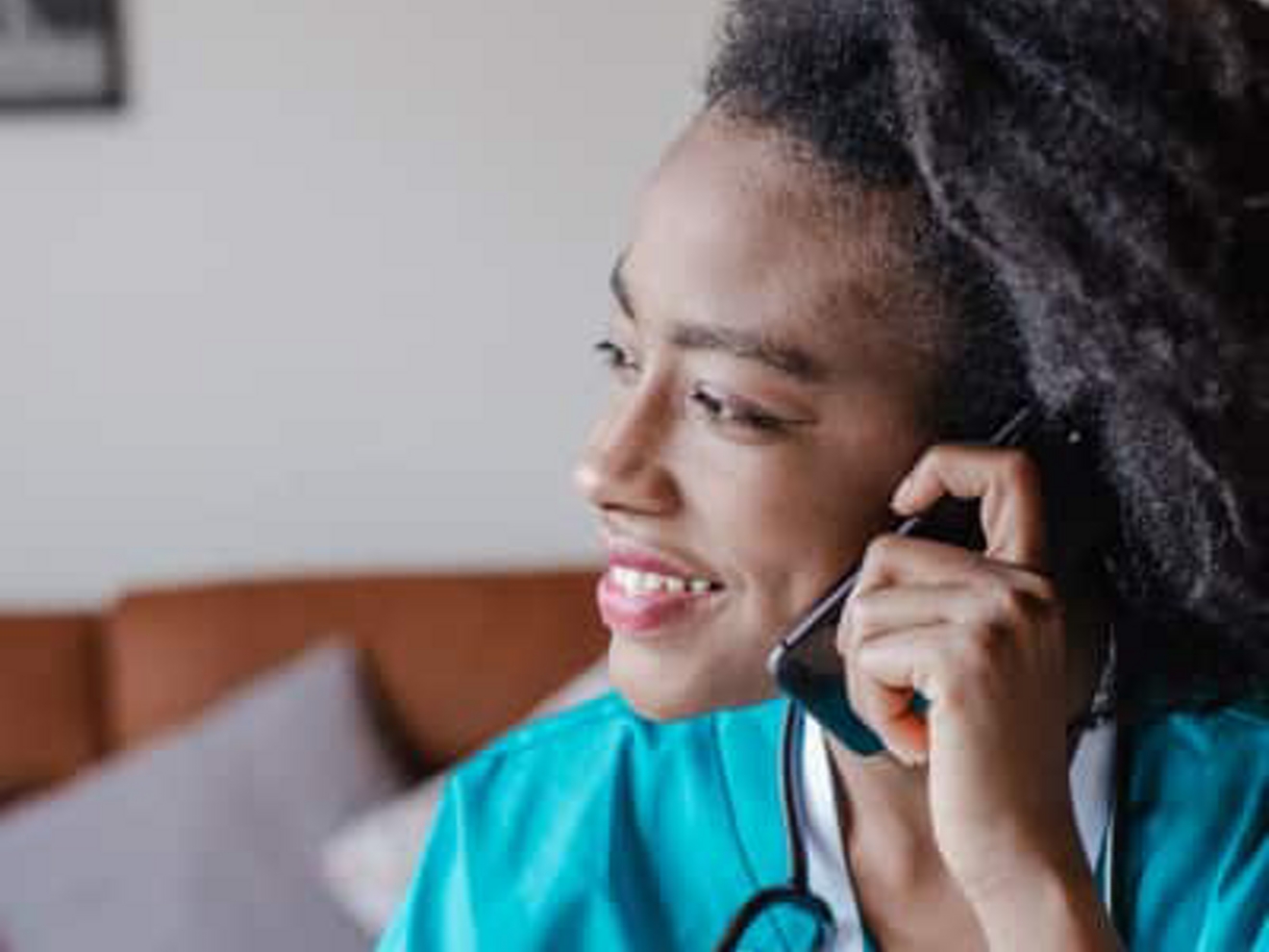 A healthcare provider receives a secure call on a mobile phone.