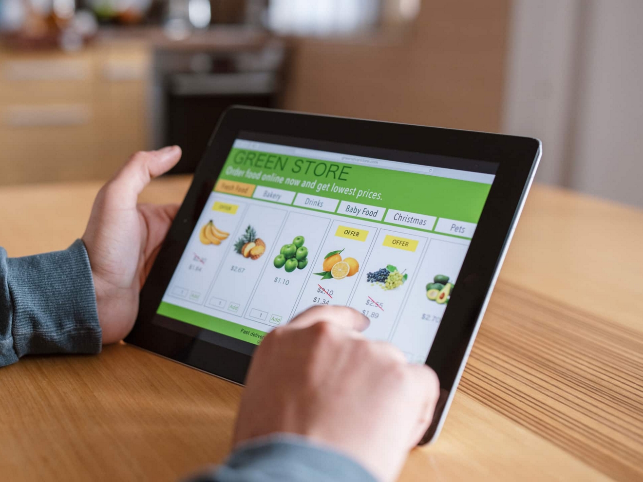 A consumer makes their grocery selection using an online app.