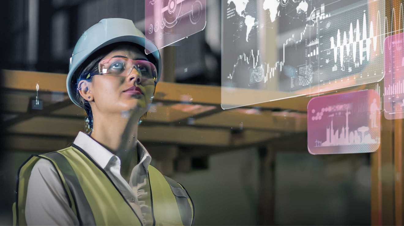 A logistics management professional uses augmented reality glasses to review transportation data.