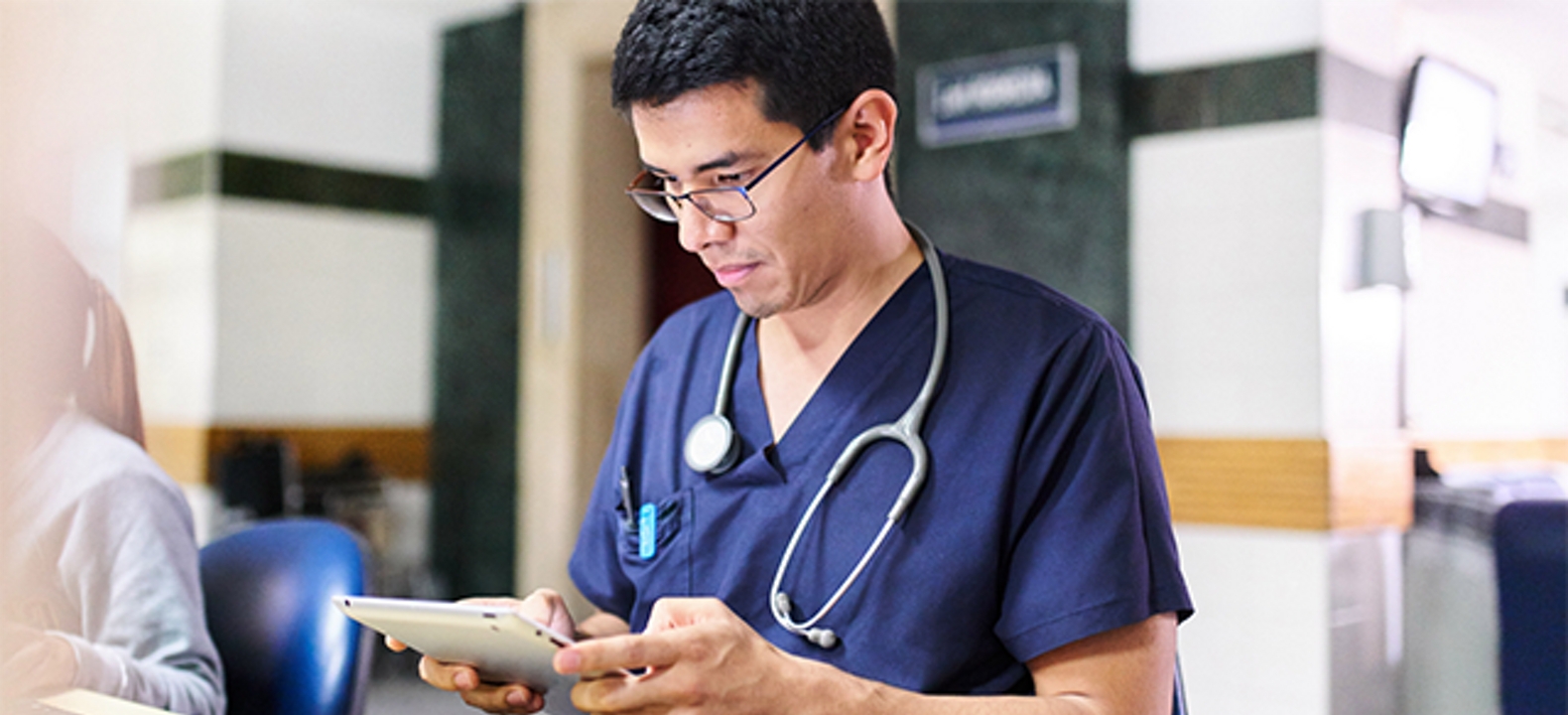 Doctor in blue scrubs