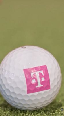 Golf ball with tmobile logo