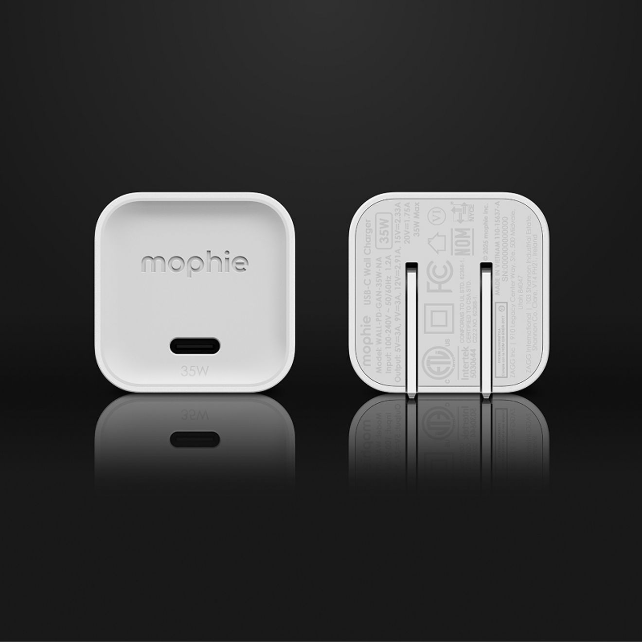 Front and back views of a compact white Mophie 35W USB-C wall charger with a single USB-C port and foldable prongs.