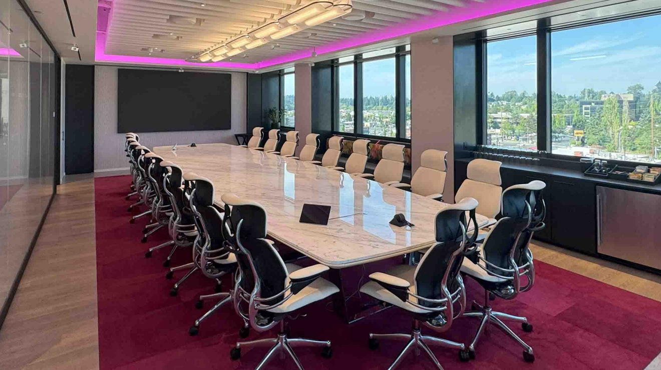A seating area and a display of brand innovators at the Executive Briefing Center in Bellevue, WA.