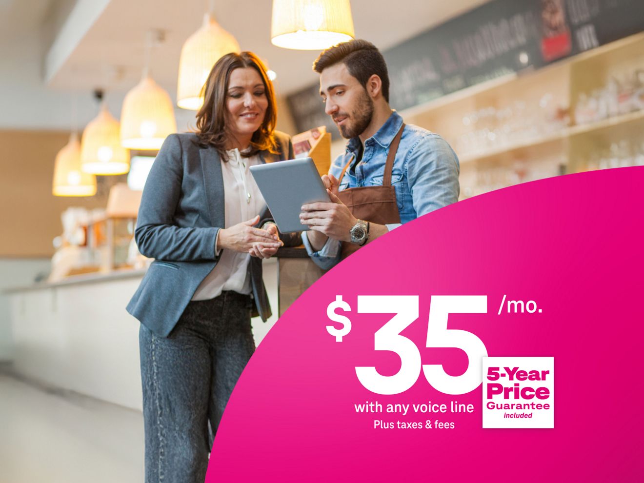 A business owner and café employee review a tablet next to a $35 per month Business Internet offer with any voice line, plus taxes and fees, and a 5-Year Price Guarantee.