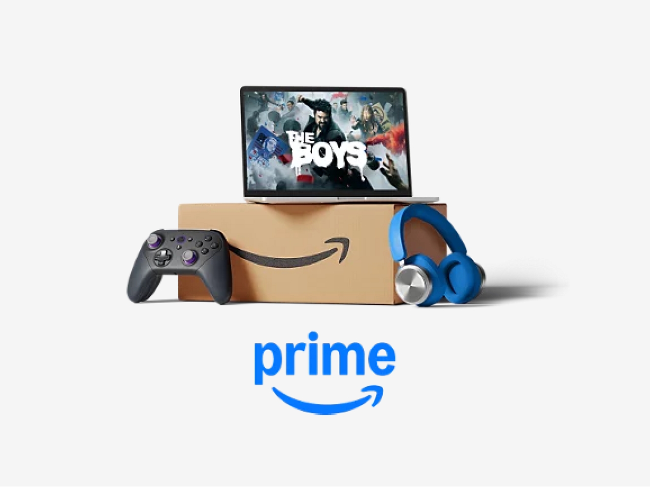 Laptop con promociones de programas de Amazon Prime sobre una caja de Amazon con un control de juegos y audífonos apoyados en ella.