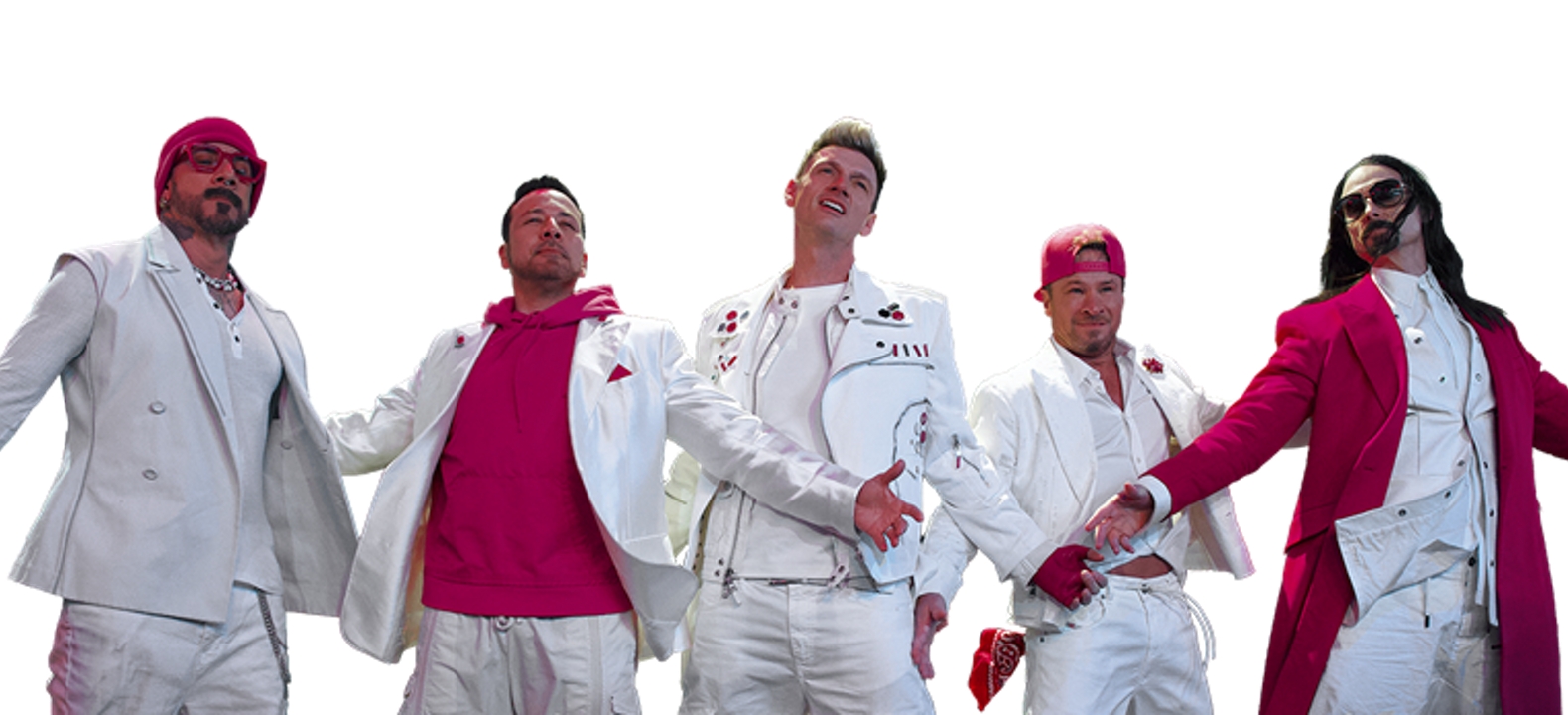 The Backstreet Boys perform together on a bright magenta background with confetti-like dots.