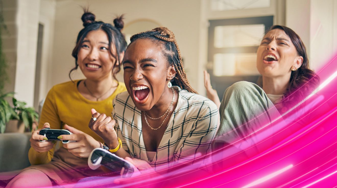 Three women playing video games.