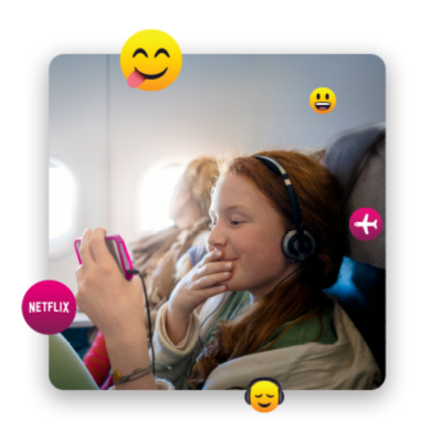 Girl watching from phone in a plane.