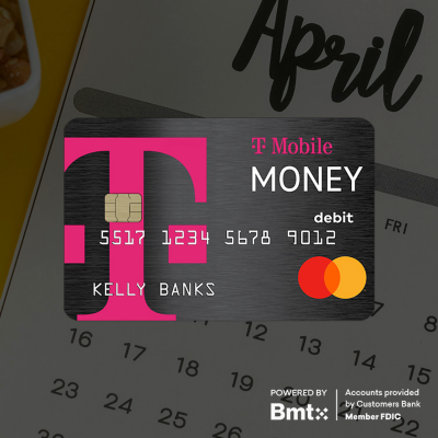 A T-Mobile Money credit card on top of an April calendar.