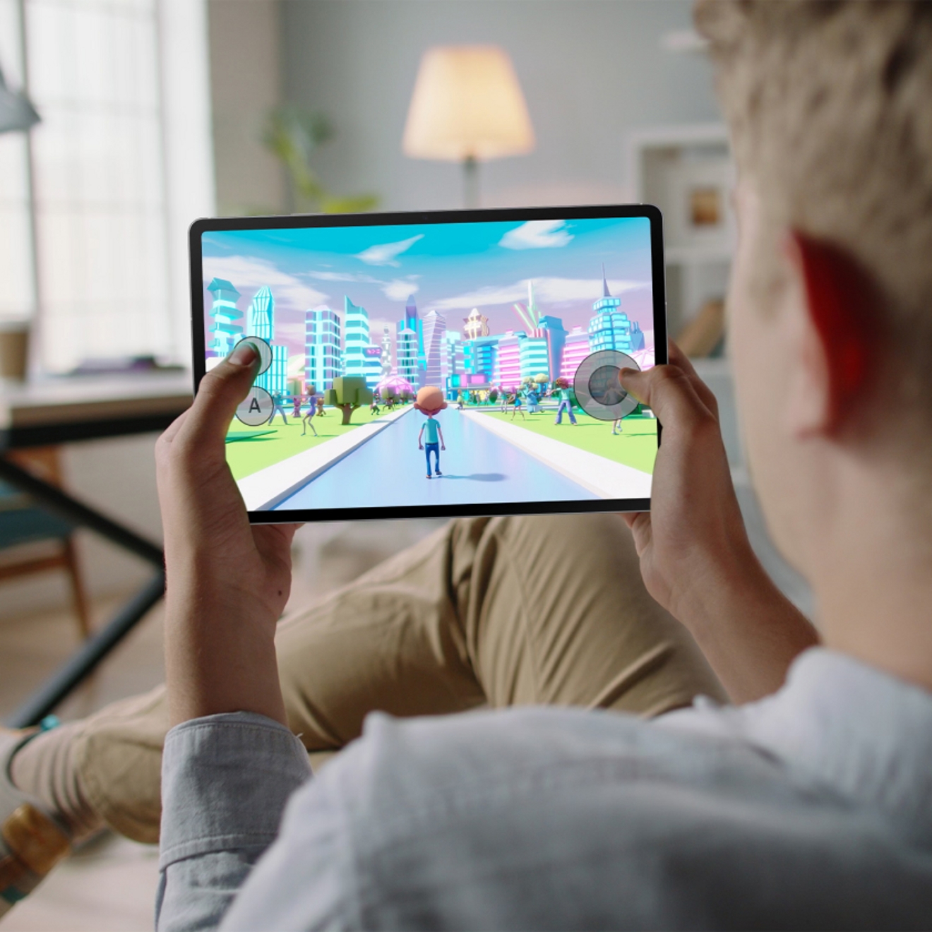 Person playing a game on Samsung S10 FE Tablet device