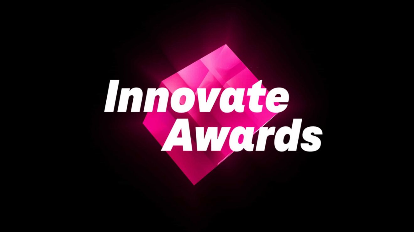 Innovate Awards, over a magenta cube suspended in a black void.