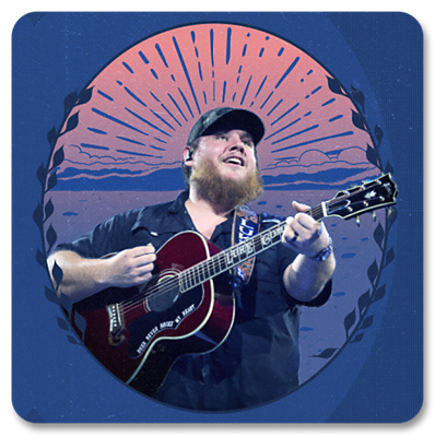Luke Combs plays a guitar and sings.