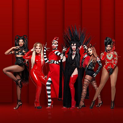 Various participants of Ru Paul’s Drag Race pose for the camera In black, white, and red costumes.