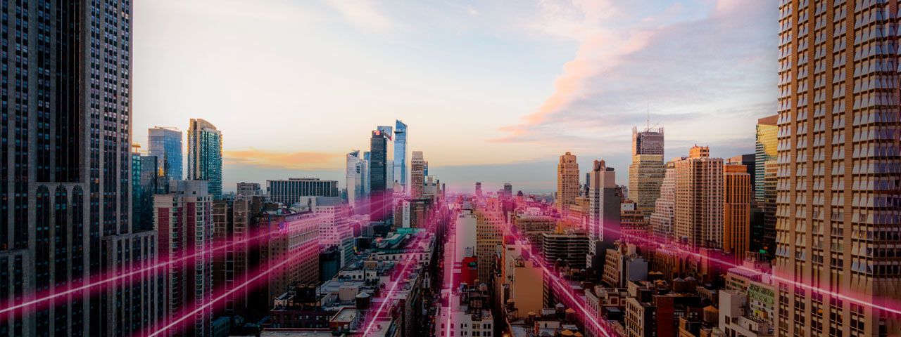Magenta rays fly over the landscape of a modern city.