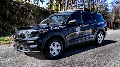 A Richland County Sheriff's Department vehicle on a rural road.