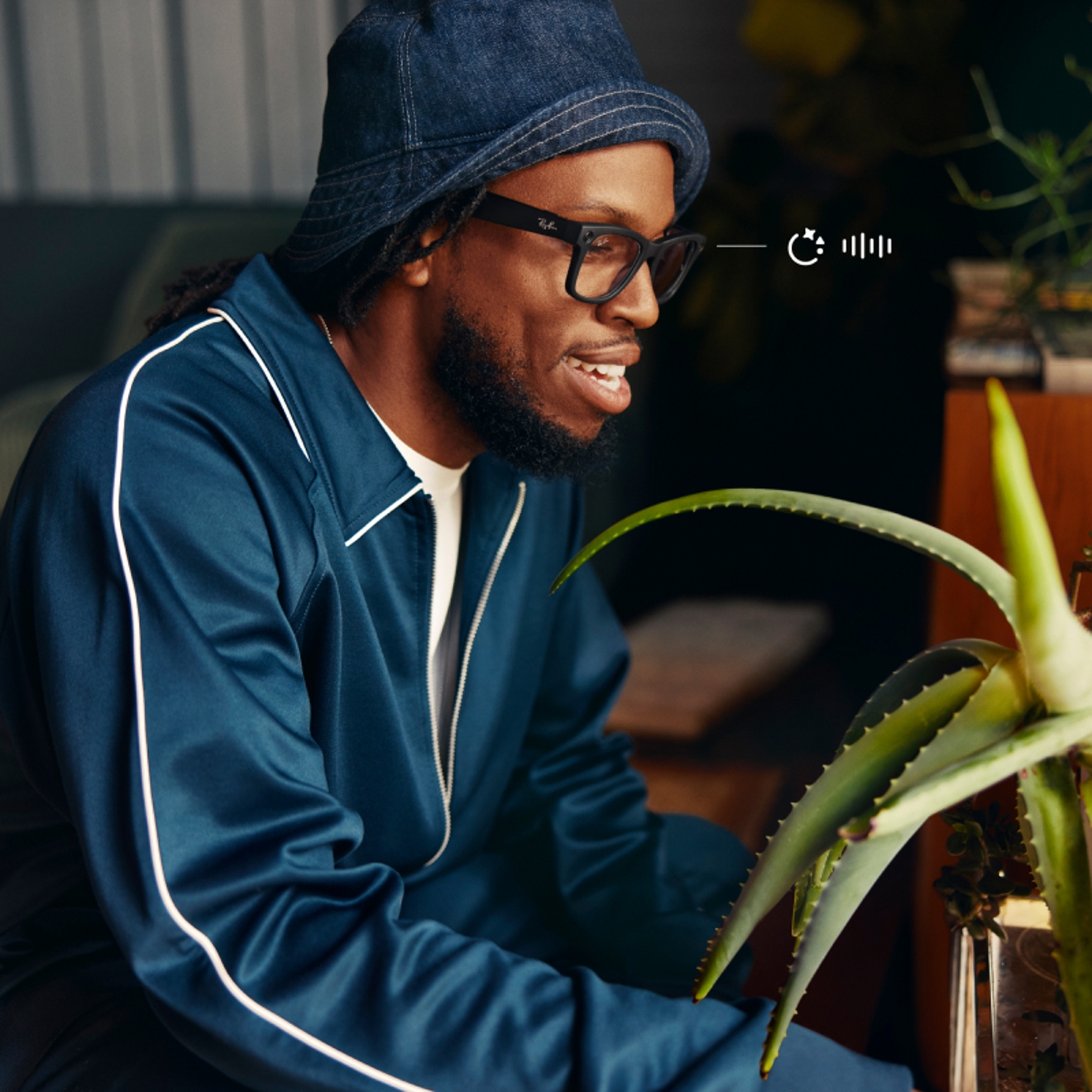 Person wearing Ray-Ban Meta glasses while tending to a plant