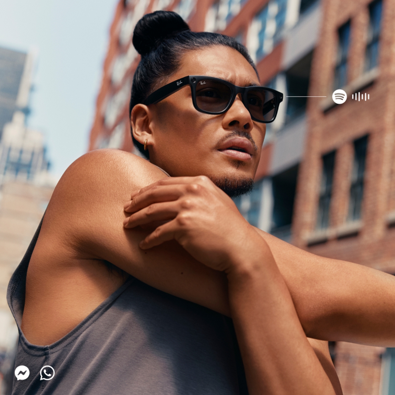 Person wearing Ray-Ban Meta glasses while walking down a city street