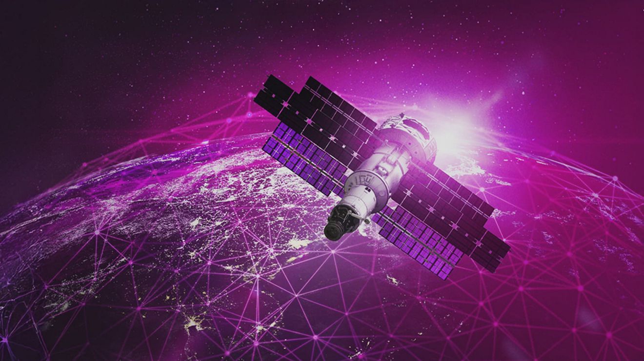 A satellite in space travels over the Earth providing connectivity to T-Mobile customers.