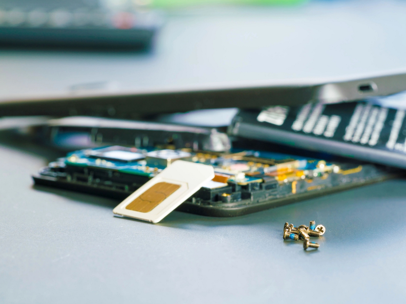 A close-up of device equipment and a SIM card.
