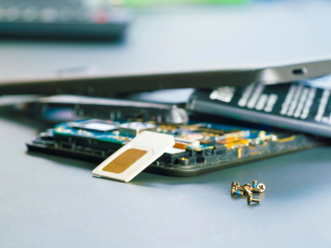 A close-up of device equipment and a SIM card.