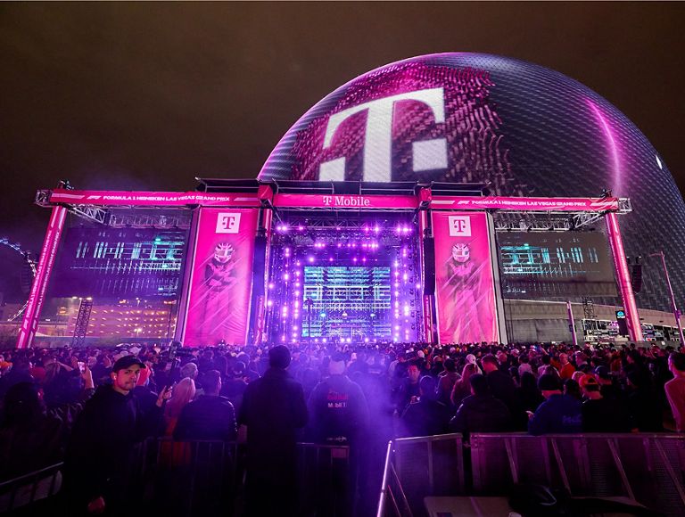 A large crowd enjoying a live musical performance at the T-Mobile Zone at Sphere.