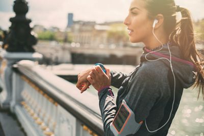 Woman overlooking city during workout