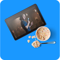A tablet showing Amazon Prime exclusive content, next to a bowl of cereal.