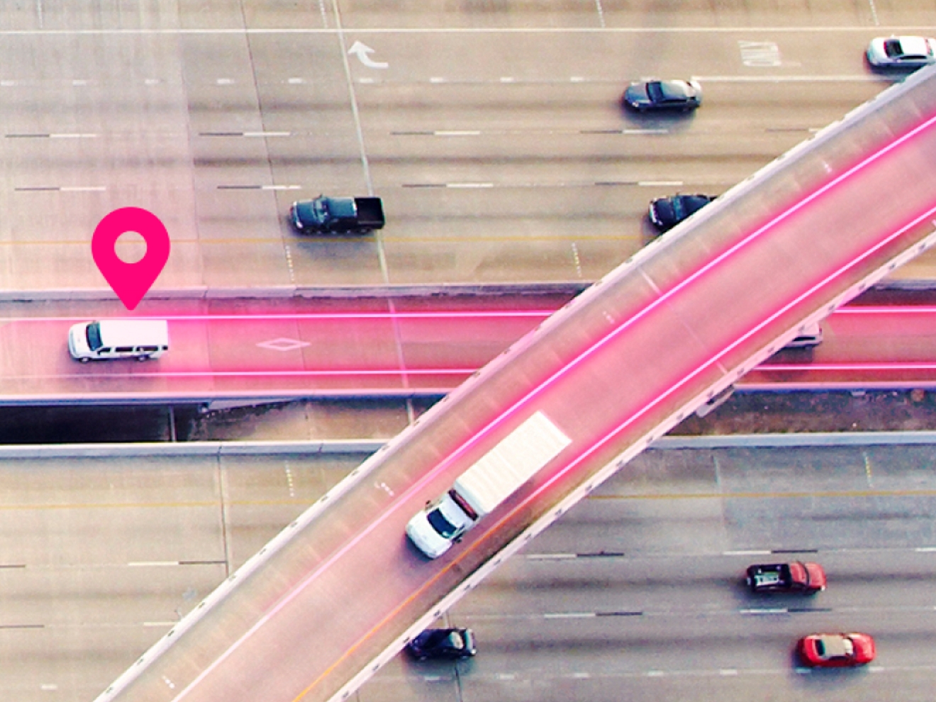 An illuminated magenta highway. 