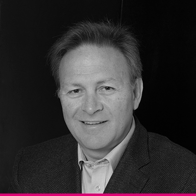 Headshot of Néstor Cano, Executive Vice President, Integration & Transformation, and Strategic Advisor to the CEO