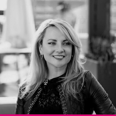 Headshot of Callie Field, President, Business Group
