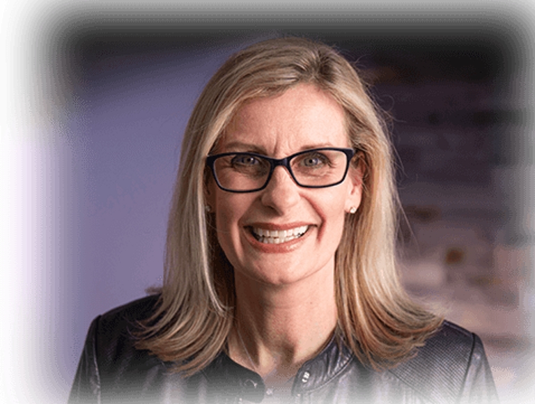 Susan Loosmore smiling at the camera
