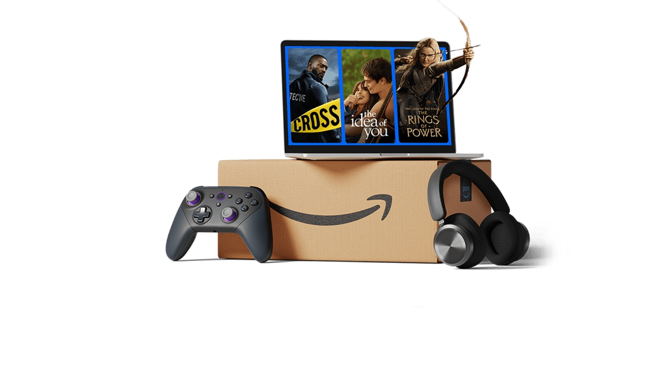 A laptop with Amazon Prime video showcasing Cross, The Idea of You, and Rings of Power, stacked on top of an Amazon package.