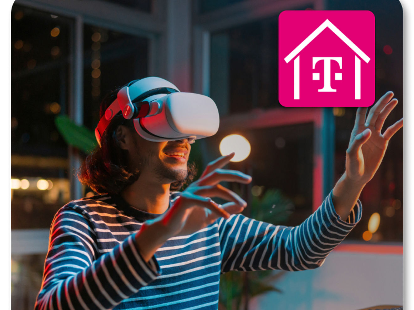 Young adult wearing a virtual reality headset and smiling.