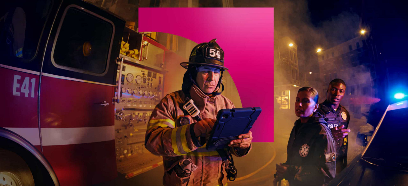 A firefighter at the scene of a fire uses the 5G network to send critical data from a digital device.