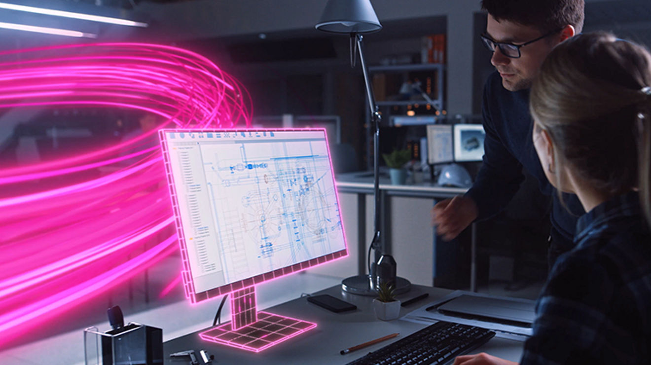 Two people look at a computer monitor which is enveloped in a magenta grid of light with magenta rays swirling behind it