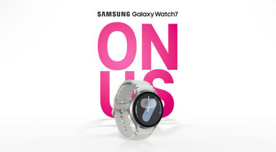 A Samsung Galaxy Watch 7 with 'On Us' text.
