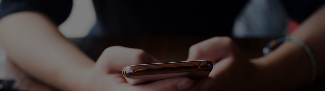 Hands holding a smartphone 